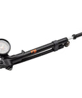 Fox high-pressure shock pump, black metal with gauge for bicycle suspension.