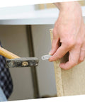Person using hammer to insert pin from 100 Piece Stainless Steel Positioning Pins Set For Quick Precise Component Alignment In Machinery And Electronics Plug And Play Ready Solid Rod Fasteners With Burr Free Smooth Finish For Reliable Fixtures And Easy Setups