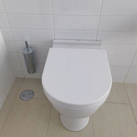 Top Shelf White Oval Toilet Seat With No Drama Soft Close Hinges Quick Top Fix Setup Crafted From Heavy Duty Polypropylene viewed from above.