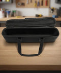 Rugged Hard Shell E Bike Battery Case 18X6X4 Inch Waterproof EVA Shockproof And Crush Proof Gear Sack For Tough Rides And Commutes open on table