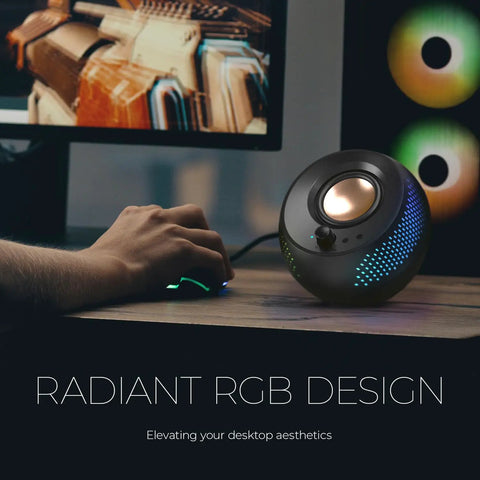 Pebble X Plus 2.1 Channel USB Type-C Desktop Computer Speakers with RGB lights on desk by monitor.