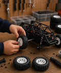 Person assembling 4 Pack RC Car Wheel Set with Rubber Tires and Metal Shaft Axles for Remote Control Cars Trucks and Robots 55mm Diameter