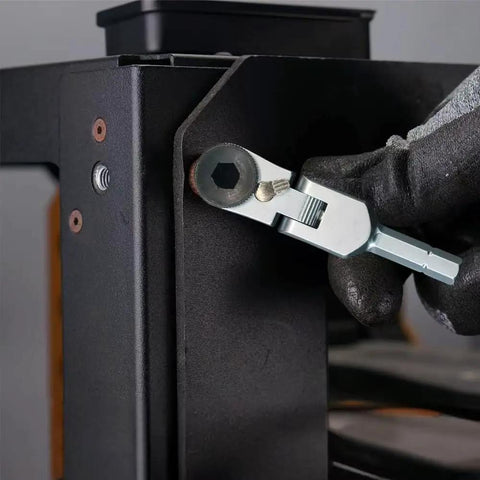 Heavy Duty Flex Head Ratchet Wrench With Hex Bit Extension And One Quarter Inch T Handle Ratchet Tool Including Socket Adapter Set Three Piece Pack used for tightening nuts on a metal frame.
