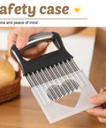 Front view of stainless steel crinkle cutter with black handle and clear plastic guard for crinkle-cut fries