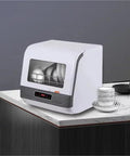 Compact Countertop Dishwasher Featuring Hot Water Sanitizing And Rapid Dry Cycle A Real Game Changer For Tight Kitchens on marble counter.