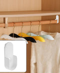 Oval Closet Rod End Supports 18 Pack White For Standard 15x30mm Flat Rods Wardrobe Rod End Brackets For Aluminum Wood And Stainless Steel Rods Easy Install showing in use with wooden rod and hangers.