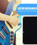 Electric Guitar Back Plate Cover With 6 Hole Plastic Cavity Backplate Closed Style Replacement Tremolo Cover Black next to blue guitar