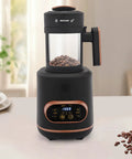Absolute Game Changer Electric Coffee Bean Roaster With Smart Temperature Control And Three Fan Speeds 1500W Home Brewing Setup on kitchen table with coffee beans.