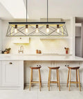 Five Light Industrial Kitchen Island Pendant Light Fixture with oak white frame over modern kitchen counter with stools