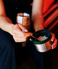 Person with Classic Vacuum Insulated Food Jar 17 Oz and 24 Oz Stainless Steel BPA Free enjoying hot meal on the go