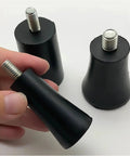 Hand holding one of the 40 Piece Adjustable Rubber Feet Pads With Screws M6 M8 For Tables And Chairs Leveling Foot Protectors.