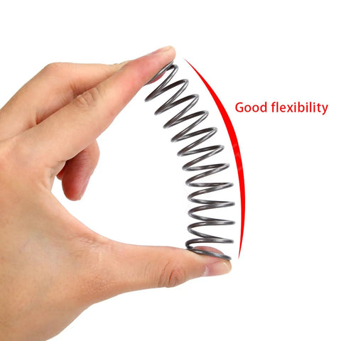 Heavy Duty Compression Spring A Heavy Lifter Built Tough For Industrial Machinery And Daily Grind High Strength Steel Wire Resists Deformation Reliable Support 1 Pc 12X80X300Mm shown in hand demonstrating good flexibility.