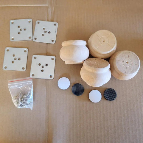 Real Deal Solid Hardwood 2 Inch Round Bun Feet For Furniture Upgrades And DIY Repairs Includes Mounting Plates With Screws Set Of Four, unpainted bun feet and hardware.