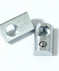 Close-up of 5/16-18 threaded steel Roll-In T-nut with ball spring, compatible with 15 and 40 series aluminum extrusion profiles, 20 pack