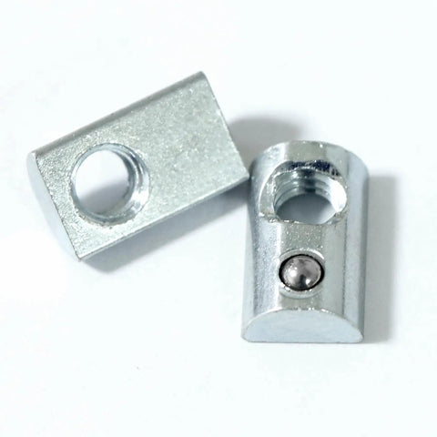 Close-up of 5/16-18 threaded steel Roll-In T-nut with ball spring, compatible with 15 and 40 series aluminum extrusion profiles, 20 pack