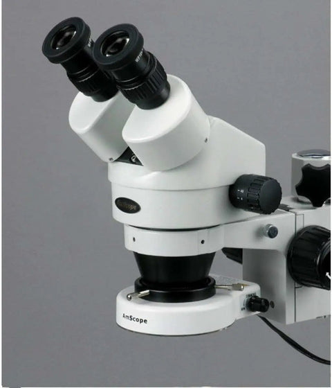 Pro Grade Binocular Stereo Zoom Microscope With Boom Stand, 7X To 45X Magnification, 0.7X To 4.5X Zoom Objective, 80 LED Ring Light, WH10x Eyepieces, Long Working Distance For Circuit Boards And Dental Gear, Maker Friendly. White binocular microscope head with eyepieces