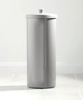 Silver discreet floor standing toilet paper holder with lid for 3 extra rolls, slim space saving bathroom organizer with decorative knob.