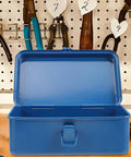 Open classic vintage blue metal toolbox on a workbench, perfect for auto repair and home fix ups. Heavy duty and portable.