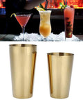 Top Shelf 304 Stainless Steel Cocktail Shaker Set With Polished Rustproof Finish Bartender Kit in gold with cocktails.
