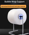 Heavy Duty Bubble Wrap Dispenser Stand With Reinforced Galvanized Steel Roll Holder for efficient packing and shipping.
