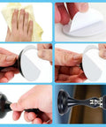 Hands preparing Solid Two Pack Black Magnetic Door Stop With Mounting Screws for installation, showing adhesive backing and grip.