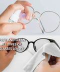 Streak Free Lens Cleaner Spray Kit With Two 2oz Bottles And Four Microfiber Cloths cleaning eyeglasses, showing spray and wipe action.