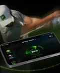 Golfer using ST MAX Launch Monitor with GOLFTEC Speed Training, displaying club speed data on screen.