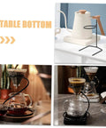 Kick Up Your Morning Brew Game With This Slick Two Piece Coffee Dripper Stand; black metal stand with coffee brewing setup.