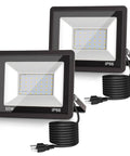 Dusk To Dawn Outdoor Flood Light 50W No Fuss Auto On Off 6000K Daylight IP66 Waterproof 2300 Lumens Plug In Security Light For Yard And Garage UL Listed 2 Pack, front view showing two lights with cords