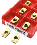 APMT1135PDER carbide inserts in red case, designed for heavy duty lathe tool applications in steel and stainless machining.