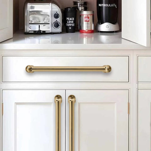 Champagne Bronze Cabinet Pulls 10 Pack For Drawers And Cabinets With Satin Brass Finish 5 Inch Hole Center installed in kitchen view
