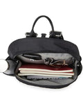 Open Anti-Theft Travel Backpack With RFID On-The-Go Slash-Resistant Nylon, Compact 8.5L Daypack, showing inner compartments with items.