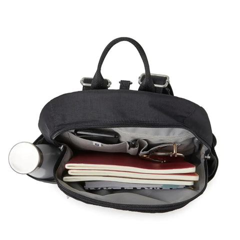 Open Anti-Theft Travel Backpack With RFID On-The-Go Slash-Resistant Nylon, Compact 8.5L Daypack, showing inner compartments with items.
