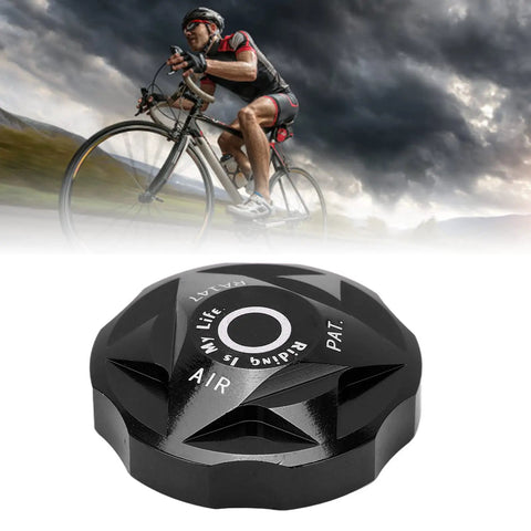 Beefy Aluminum Front Fork Cover With Suspension Cap And Air Chamber Shield for mountain and road bikes, black detail view.