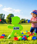 Kid Alert Street Safety Sign 31 Inch Green Caution Sign for Neighborhoods and Schools next to a child playing in a field.