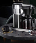 Fully Automatic Bean To Cup Coffee Machine With Fresh Ground Beans And Big 1250 Ml Tank, 11 To 15 Cup Batch, No Fuss Drip Brewer For Home Office Or Shop Setup In Sleek Gray Silver on a modern table.