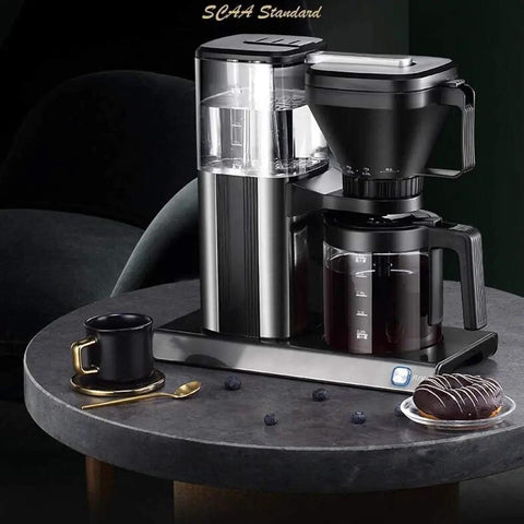 Fully Automatic Bean To Cup Coffee Machine With Fresh Ground Beans And Big 1250 Ml Tank, 11 To 15 Cup Batch, No Fuss Drip Brewer For Home Office Or Shop Setup In Sleek Gray Silver on a modern table.