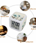 Works Like A Charm Digital Alarm Clock With Spring Blossom Cube Look showing time and temperature, designed for bedside or desk use.