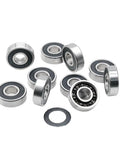 Top Tier Single Pack 6000 RS Deep Groove Ball Bearings 10mm X 26mm X 8mm Hybrid Steel Rings Ceramic Balls arranged on a white background.