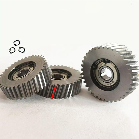 Close-up of Three Pack E Bike Motor Gear Clutch Kit With 36 Tooth Planetary Gear And 7.94mm Steel Bearings for electric bikes.