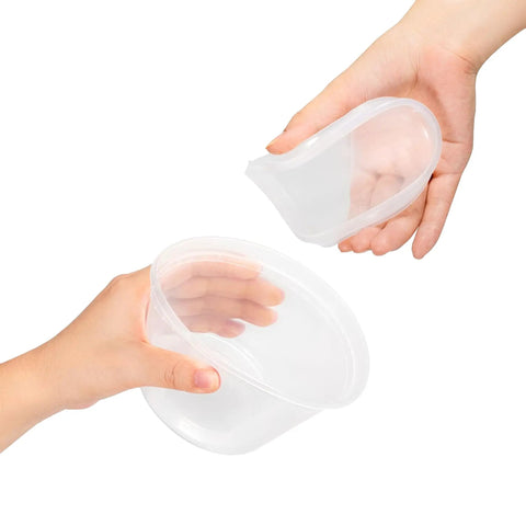 Hands holding 50 Pack 16 Oz Clear Plastic Deli Containers With Lids For Grab And Go Meal Prep, Airtight Leakproof Food Storage, BPA Free, Stackable