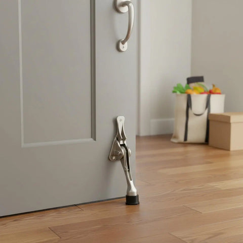 Foot Operated Door Stop With Zinc Alloy Floor Holder For Hands Free Entryway Access in a home setting