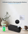 Bluetooth Speaker With FM Radio And 5 In 1 Music Player charging on table, showing 3000mAh battery indicator, USB port detail.