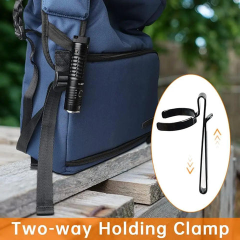 TS22 4500 Lumen Rechargeable LED Flashlight With Magnetic Charging IP68 Waterproof clipped to a backpack strap outdoors