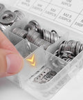 Close-up of 580 Piece Stainless Steel Washer Set From M2 To M12 With Flat And Spring Lock Washers For Home Auto And Industrial Projects A Versatile Durable Fasteners Kit in a labeled box.