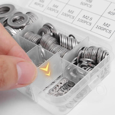 Close-up of 580 Piece Stainless Steel Washer Set From M2 To M12 With Flat And Spring Lock Washers For Home Auto And Industrial Projects A Versatile Durable Fasteners Kit in a labeled box.
