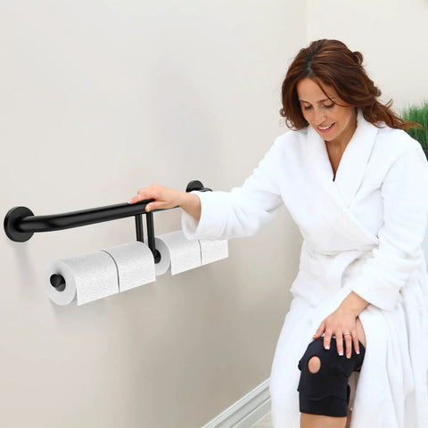 No Sweat Matte Black Grab Bar With Double Toilet Paper Roll Holder Combo installed in bathroom with user in robe.