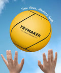 Child reaching for yellow ball, Ultimate Tetherball Set With Ball, Rope And Carabiner For Backyard Fun, clear blue sky in background.
