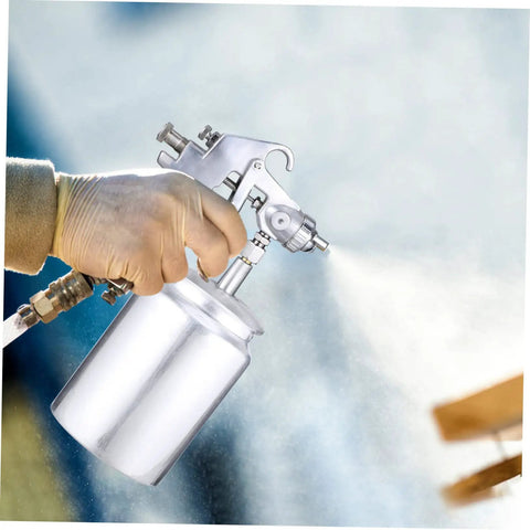 Autsuppl Airless Paint Sprayer For Furniture, High Atomization Pneumatic Spray Gun Tool For Rustoleum in use with hand holding it.