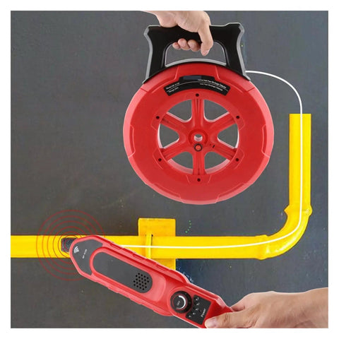 Bullseye Accuracy Heavy Duty Stud Finder And Wall Scanner detecting yellow PVC pipes with a red wireless probe in hand.